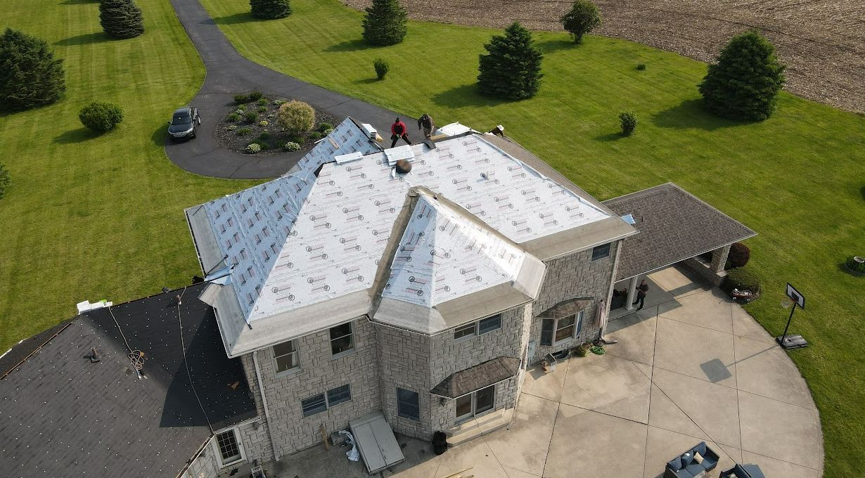 drone photos of large residential roof installation