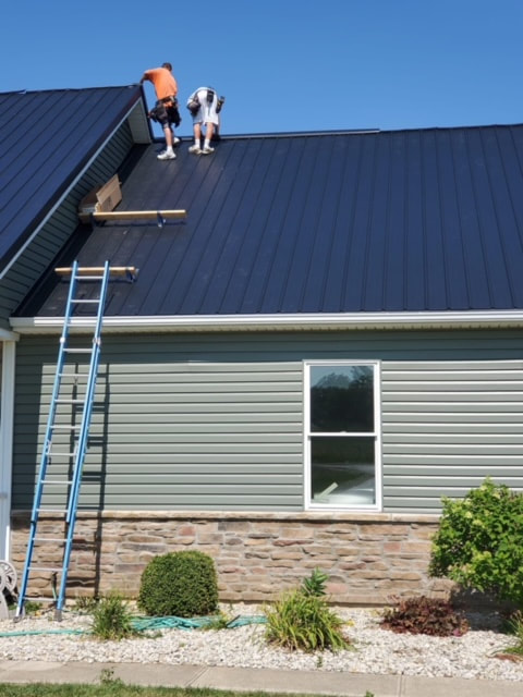 new blue metal roof on residential home